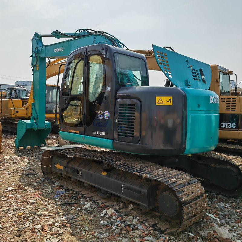 0.7m3 Capacidade de balde 13 toneladas Cor azul Excavadora de segunda mão Kobelco Sk 135