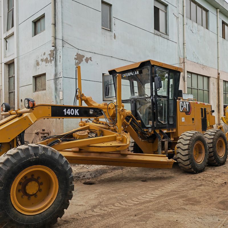 Excavadora usada, niveladora de terra, máquina de estrada Caterpillar CAT140K, japonês, motor de trator, em bom estado.