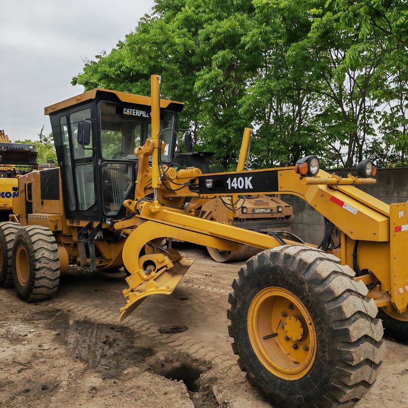 Excavadora usada, niveladora de terra, máquina de estrada Caterpillar CAT140K, japonês, motor de trator, em bom estado.