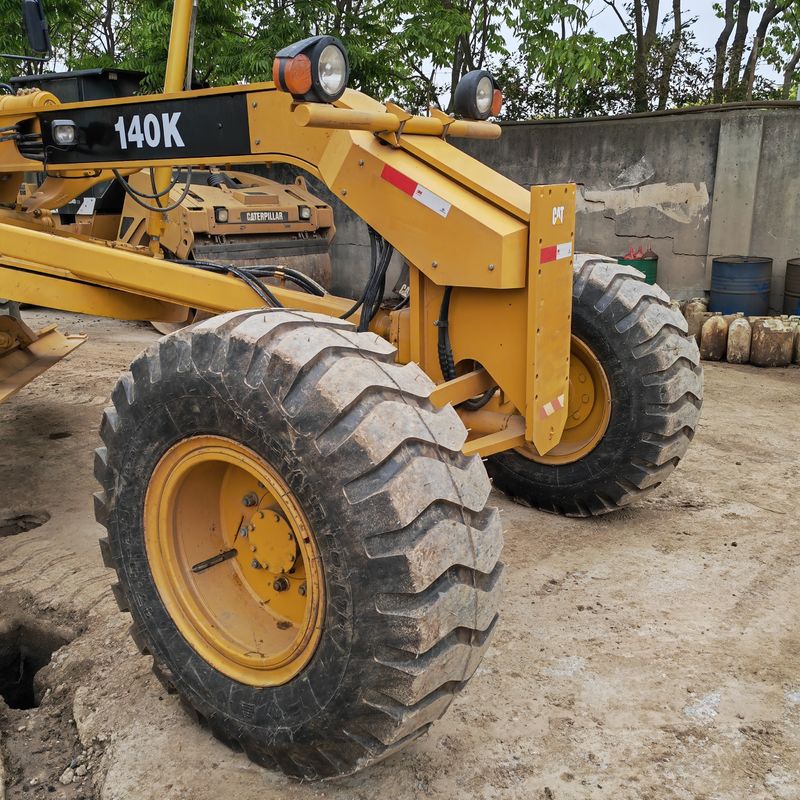 Excavadora usada, niveladora de terra, máquina de estrada Caterpillar CAT140K, japonês, motor de trator, em bom estado.